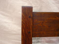 Detail of the pinned mortise and tenon construction of the back of the settle.